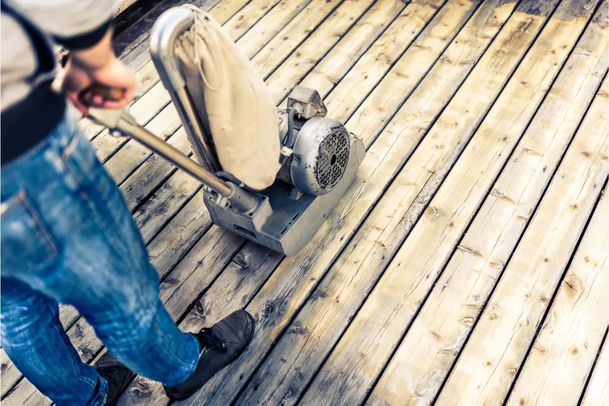 Contractor Restoring Old Deck