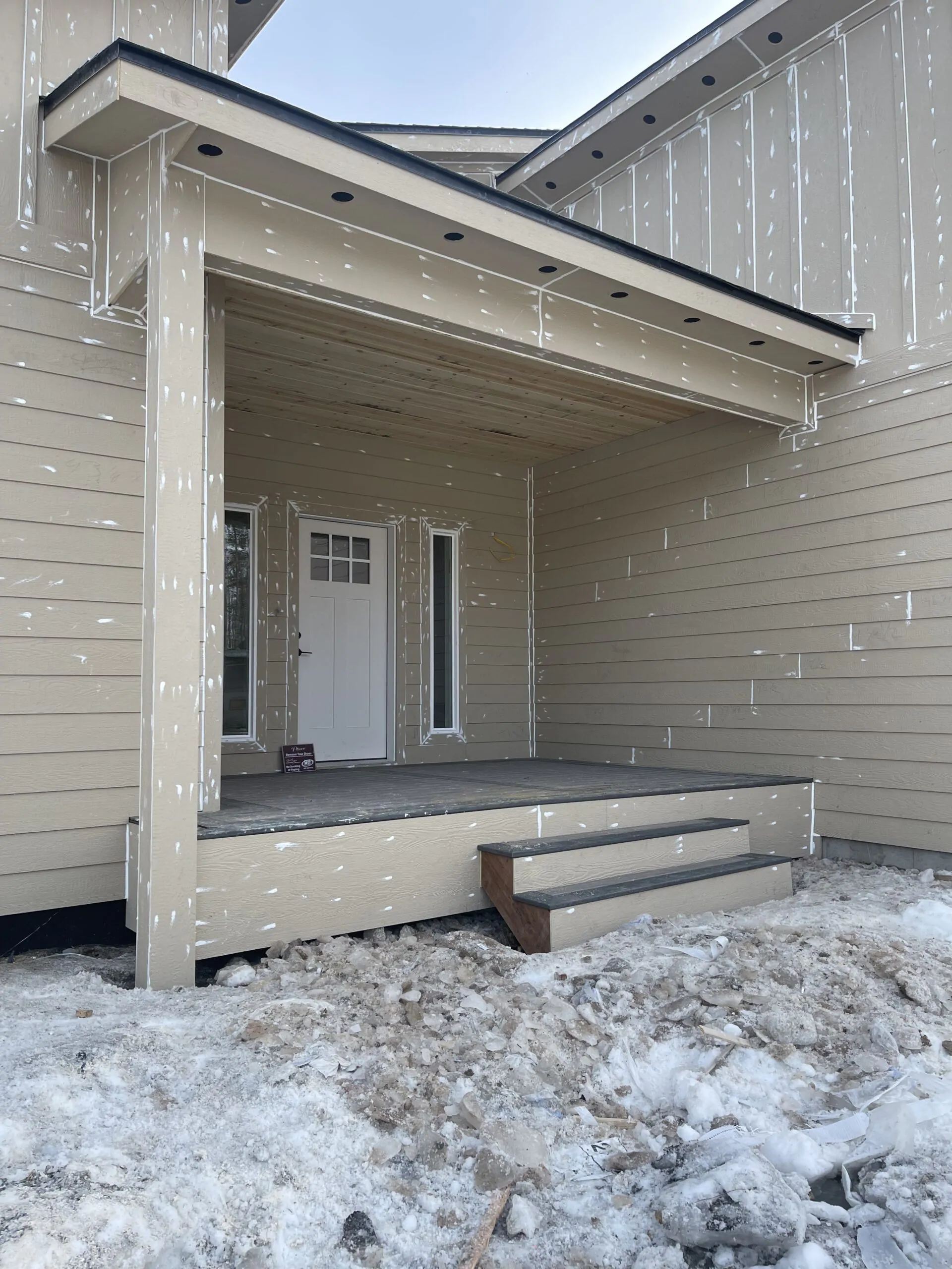 Front porch with new siding installed