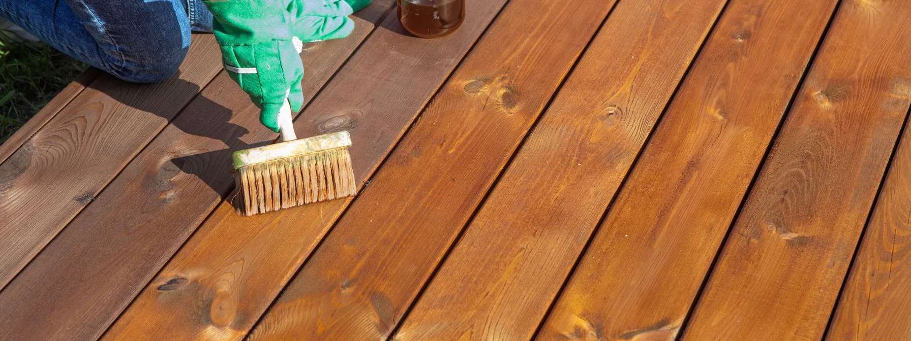 restoring an old deck using a brush